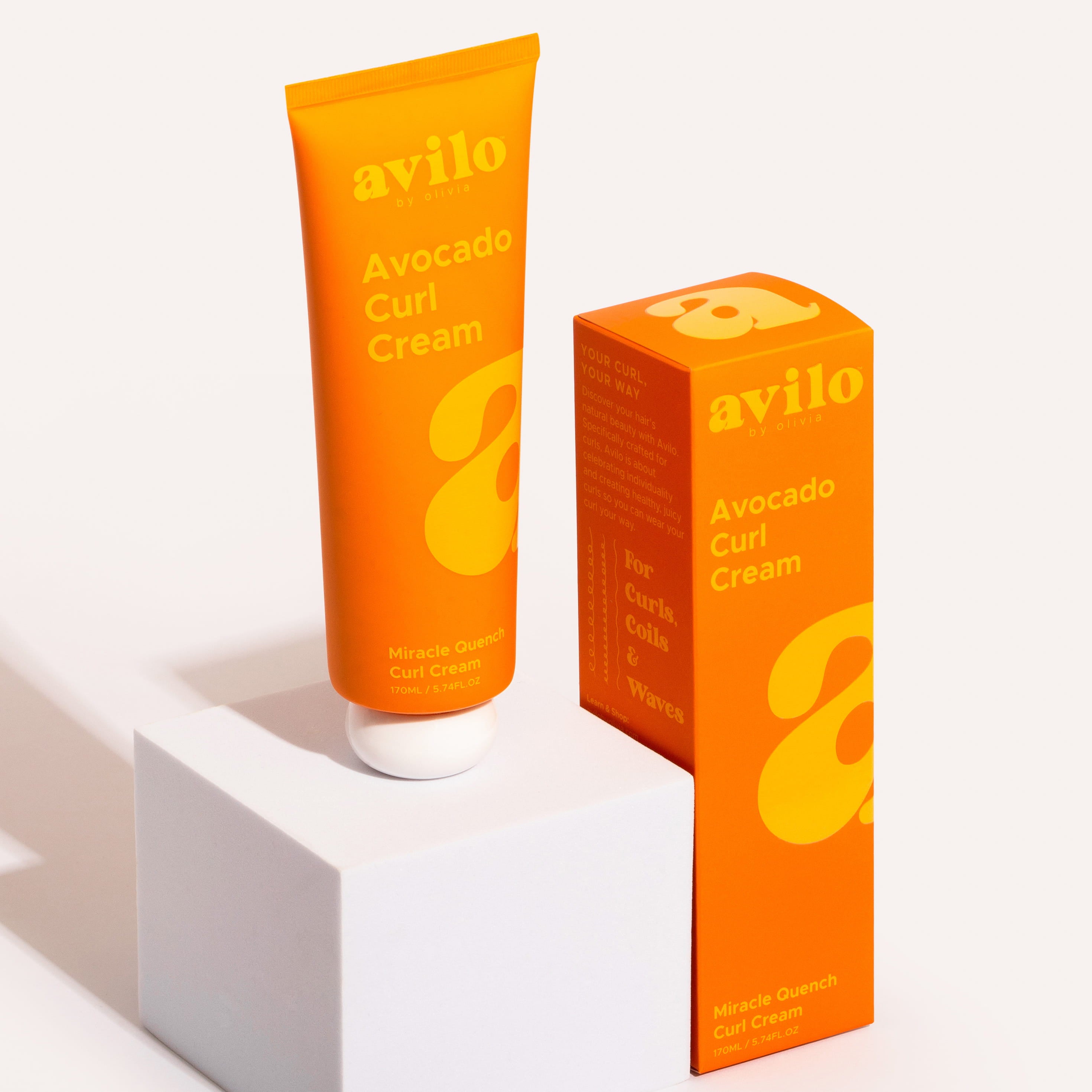 Avilo Avocado Curl Cream tube and packaging on a white background