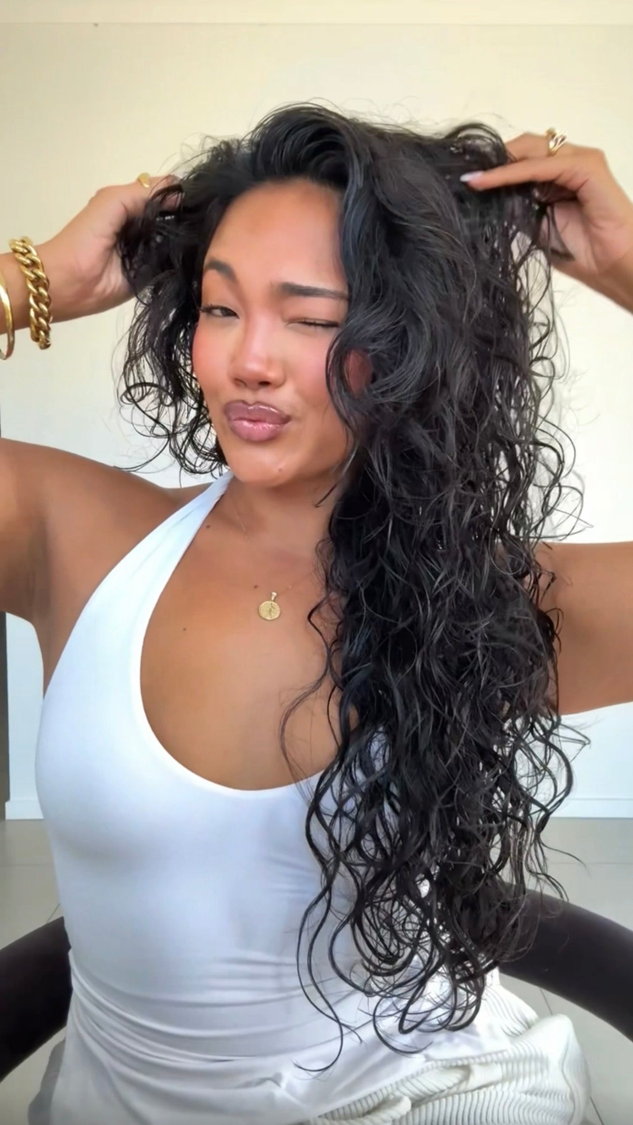 Woman with long, wavy black hair