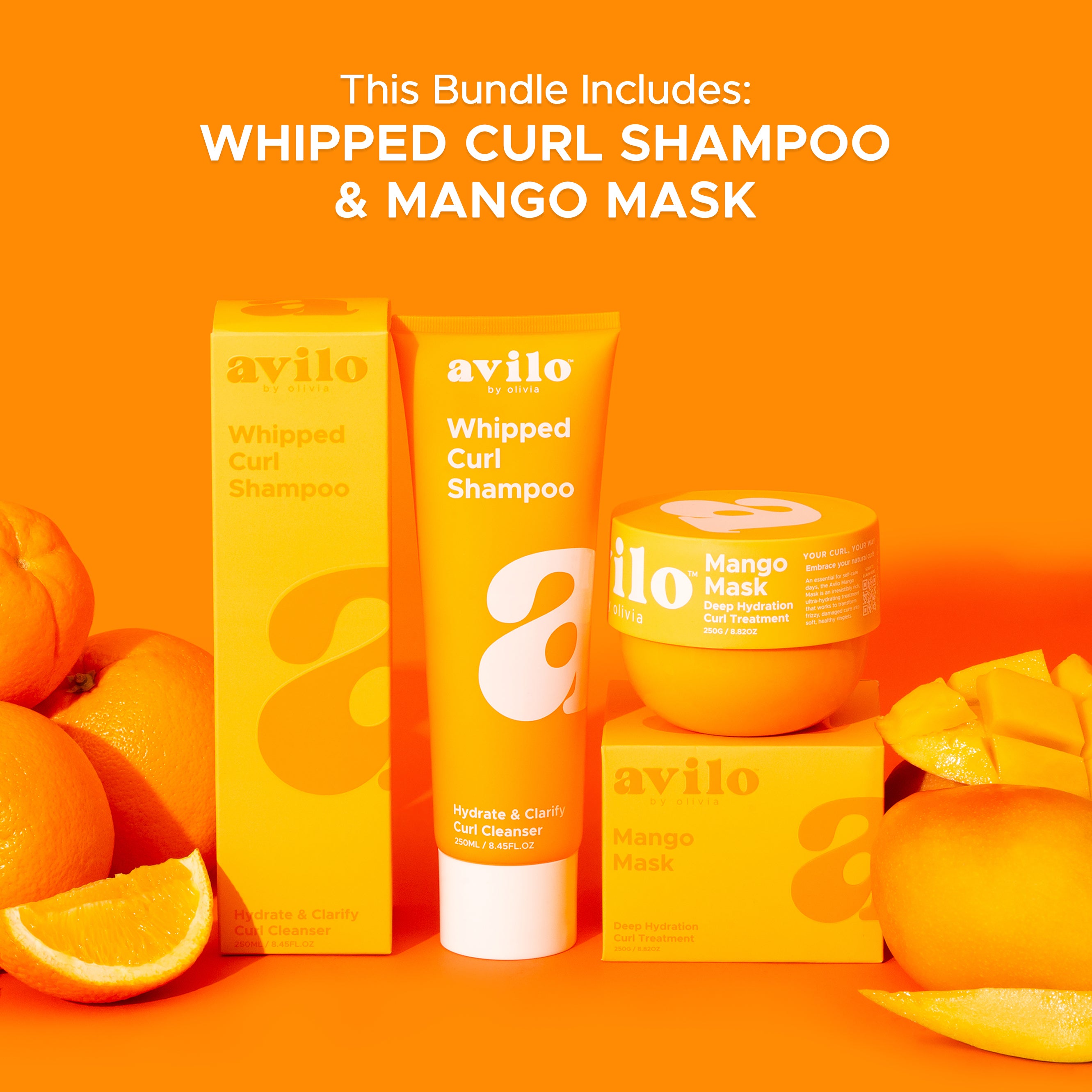 Avilo whipped curl shampoo and mango mask products on an orange background 